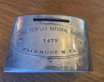 antique metal coin bank from People's National Bank, Fairmont, WV, 1477
