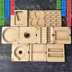 Pode incluir: Um conjunto de nove modelos de madeira para artesanato, com diferentes formas e tamanhos. Os modelos são feitos de madeira marrom claro e têm um acabamento liso. Os modelos são etiquetados como "Top" e incluem uma variedade de formas, incluindo círculos, quadrados e retângulos.