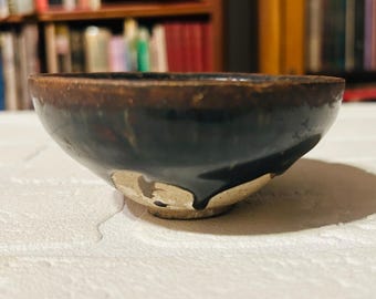 Authentic Chinese Song dynasty black glazed tea bowl, good condition, 4 inches across by 1 3/4 tall.  circa Song Dynasty 960 to 1279 AD.
