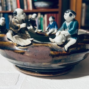 Rare Japanese Sumida Gawa/yaki ware, Jihei made late 1800s to early 1900s, signed Stamped. With five figurines.  A true fantastic example.