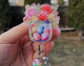 Spring flower badge reel with Roses or Tulips. Matching bead charm.