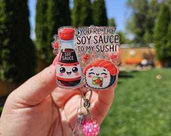 Sushi badge reel. Holographic glitter. UVDTF decals. Bead charm.