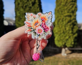 Flower badge reels. Daisies, Peonies. Matching bead charm.