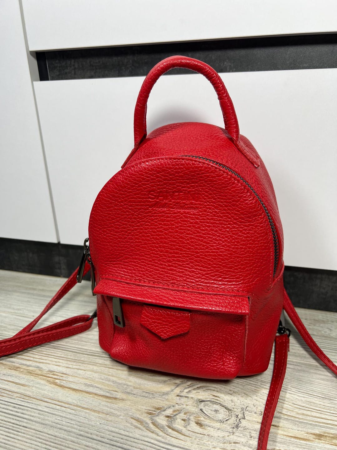 french connection mini backpack in red Minnie Mouse Exclusive Glitter Tonal | Officially Licensed | Plastic/Vegan Leather Whos ready to rock the dots again with Disneys Minnie Mouse Santini Firenze Red Leather Mini