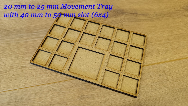 May include: Wooden movement tray with 24 compartments, each measuring 20 mm to 25 mm. The tray has a larger compartment in the centre, measuring 40 mm to 50 mm. The tray is made of light brown wood and has a dark brown border.