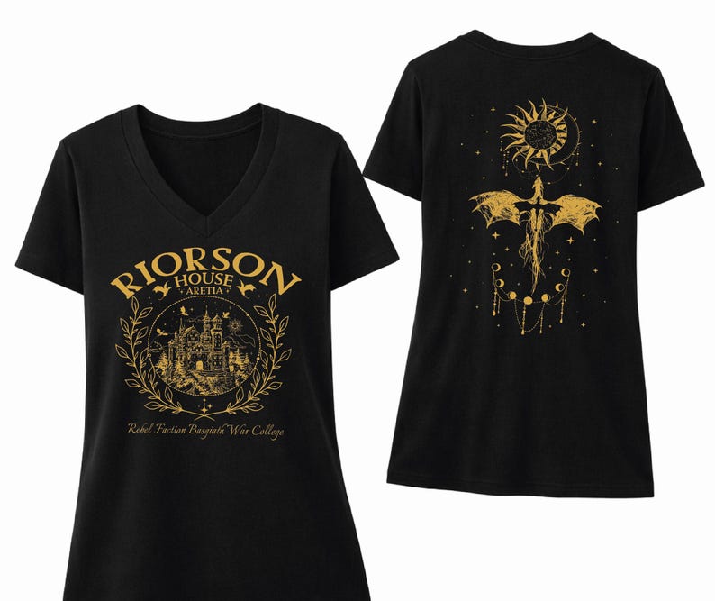 a black t-shirt with a gold design on the front and back. The front design includes a castle and a dragon, while the back design features a sun and a moon. The text on the t-shirt reads "Rierson House Aketia Rebel Fusion Basalt War College".