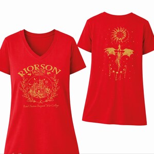 a red T-shirt with a gold design on the front and back.