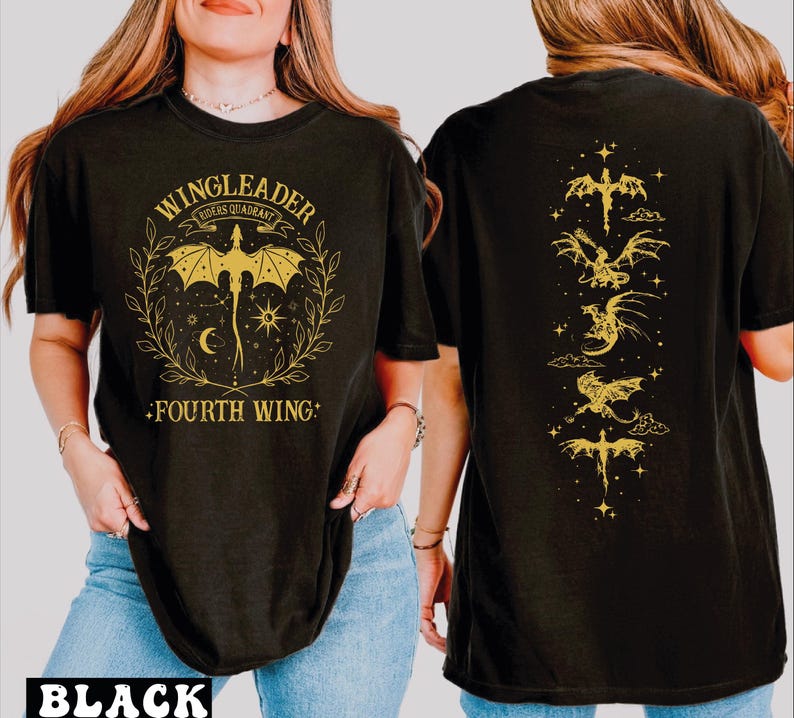 A woman wearing a black t-shirt with a graphic design featuring a dragon and the text "WINGLEADER FOURTH WING".