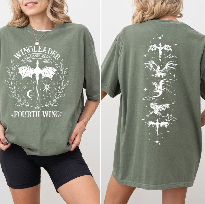 A woman wearing a green t-shirt with a graphic design featuring a dragon and the text "WINGLEADER RIDERS IN WING".