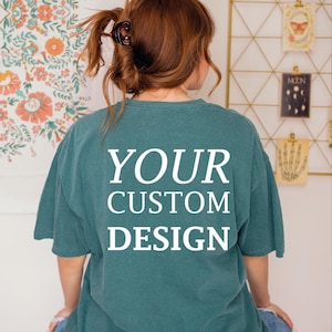 a woman wearing a t - shirt that says your custom design