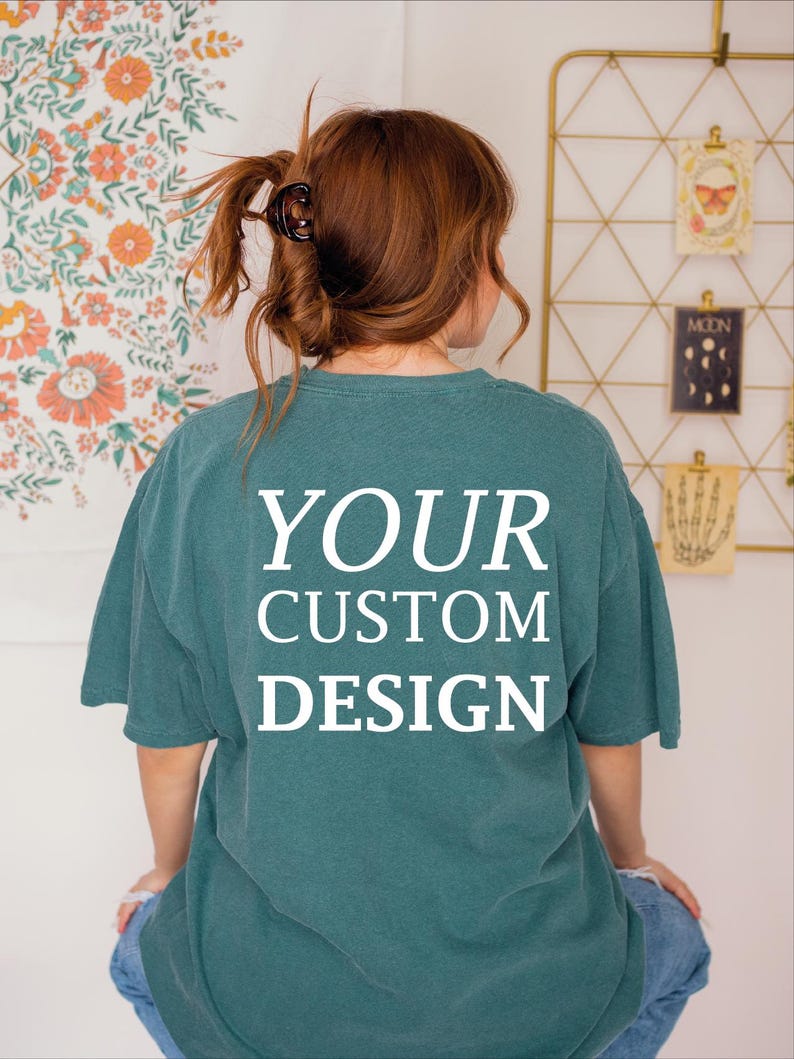 a woman wearing a t - shirt that says your custom design