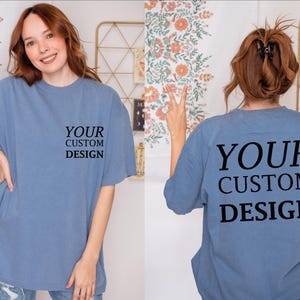 a woman wearing a t - shirt that says your custom design