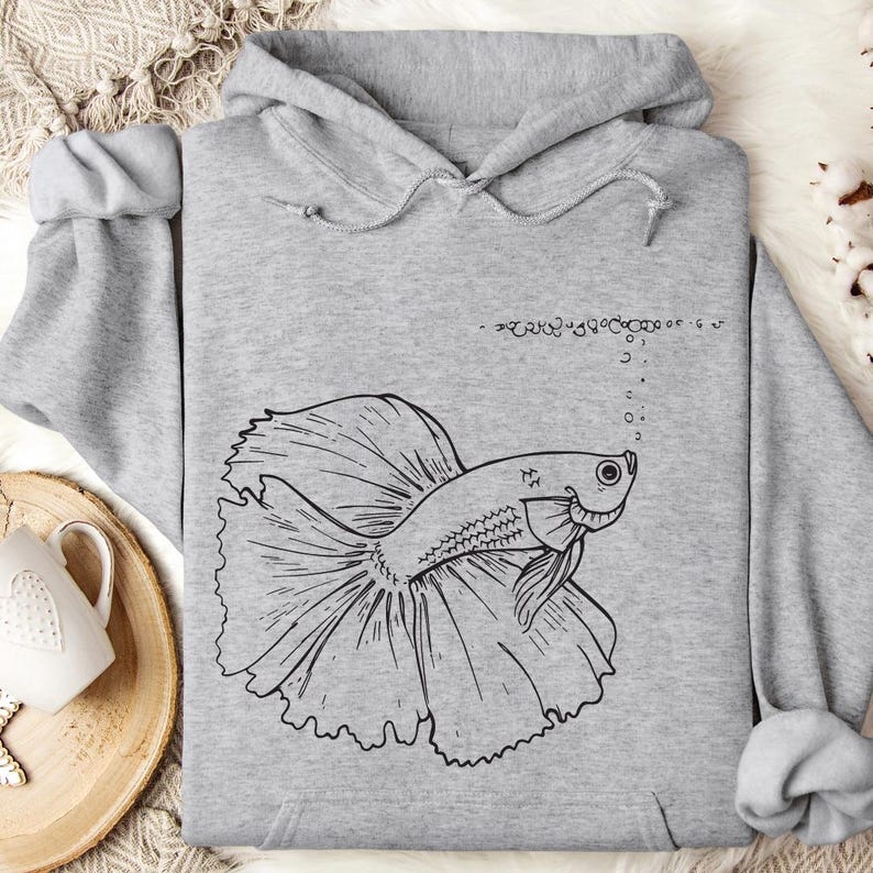 a sweatshirt with a drawing of a fish on it