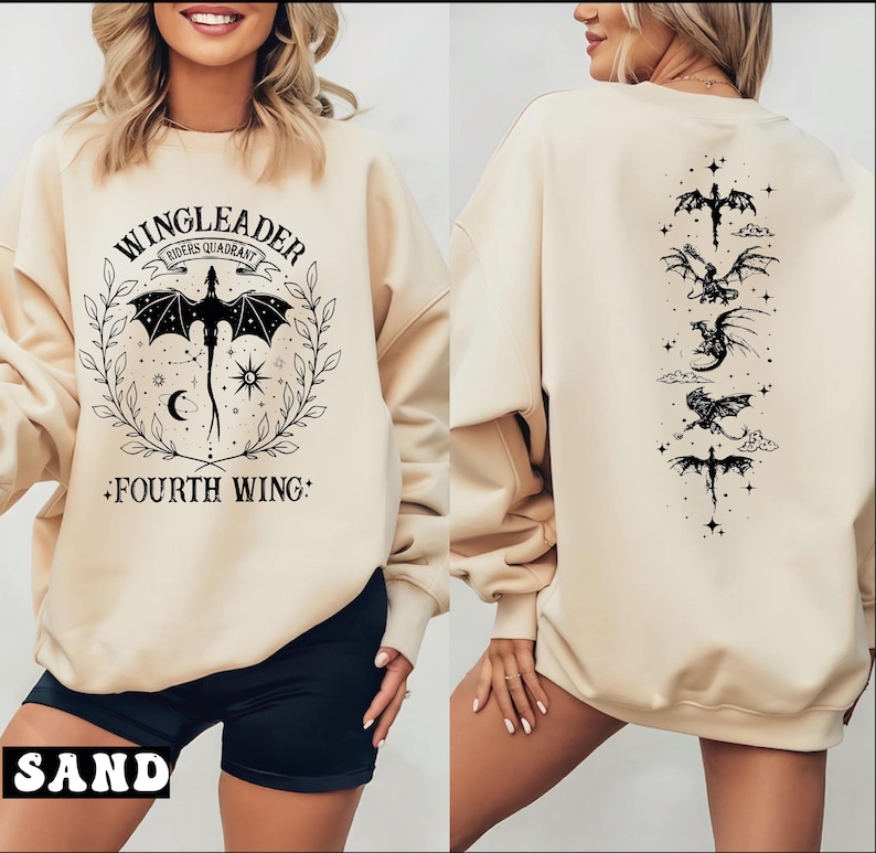 A woman wearing a beige sweatshirt with a graphic design featuring a dragon and the text "WINGLEADER - Fourth Wing" printed on it.