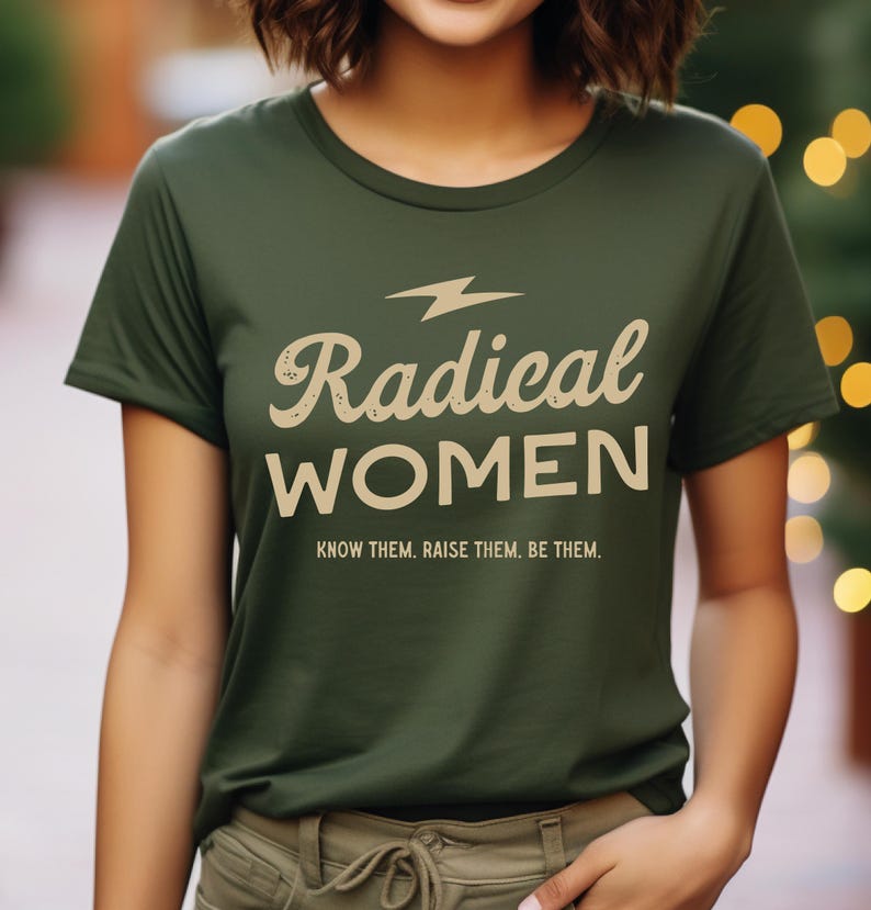 a woman wearing a green radical women t - shirt