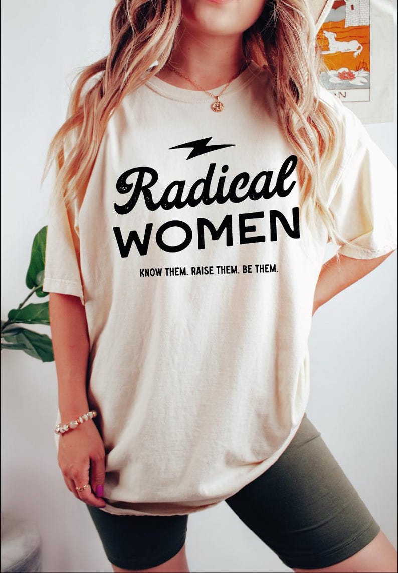a woman wearing a t - shirt that says radical women