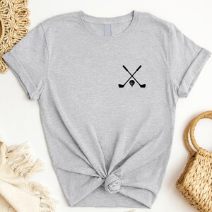 a t - shirt with a crossed crossed crossed crossed crossed crossed crossed crossed crossed crossed