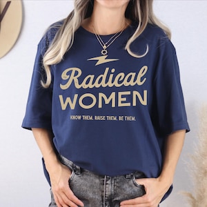 a woman wearing a t - shirt that says radical women