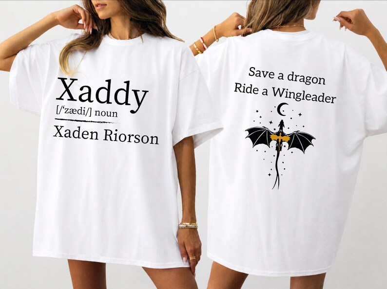 two white t-shirts with black text and graphics. The text on the t-shirts reads "Xaddy" and "Xaden Riordan" and includes a dragon graphic.