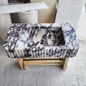 Hand Carved Calacatta Viola Marble Sink: Fluted Front Vanity