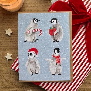 Carte de Noël aquarelle pingouins, carte de souhait, pingouins festifs mignons, aquarelle originale, Carte de voeux faite à la main