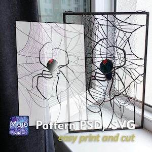 May include: Two decorative panels featuring spiderweb and spider designs. One is a print on white paper, the other is a stained glass panel. The spider has a red dot on its back. The text "Pattern PSD/SVG easy print and cut" is visible.