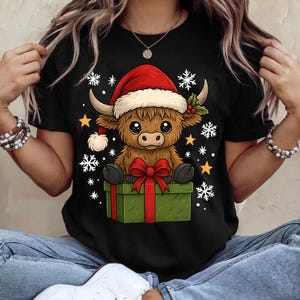 Cute Highland Cow Christmas PNG, Santa Hat Cow on Gift Box Sublimation, Holiday Baby Animal Clipart, Xmas Cow PNG for Shirt Design