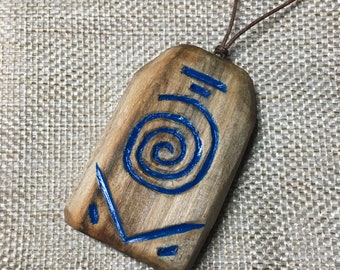 Magic amulet. Amulet for protection. Necklace with a talisman pendant for good luck.