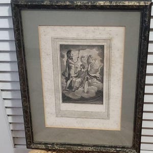 May include: Framed black and white print depicting classical figures. The artwork features two figures, one holding a spear and the other seated on a cloud. The frame is dark with gold accents, and the print is matted in gray.