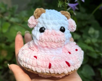 gehäkelte sommerliche Kuh in Donut fliesendes handgemachtes Stofftier Plüsch