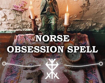 May include: A pink and floral patterned cloth with the text "NORSE OBSESSION SPELL" in white letters. A green statue of a person with their hands clasped in prayer is in the center of the cloth. There are two white candles, two small bowls, and a crystal on the cloth. The text "same day cast" is at the bottom of the cloth.