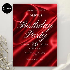 Op de afbeelding: Rode verjaardagsfeestuitnodiging met witte scripttekst. De uitnodiging luidt "Olivia's Birthday Party" en bevat de datum, tijd en RSVP-informatie. De achtergrond heeft een zijdeachtige textuur.