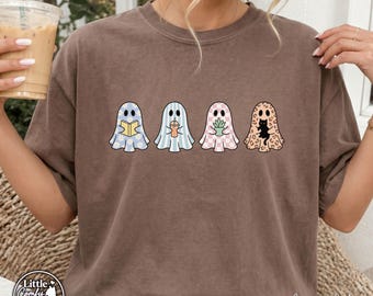 Maglietta con fantasma pastello, maglietta grafica da ragazza appassionata di libri, maglietta di Halloween/estate/inverno, regalo alla moda per gli amanti della lettura, abbigliamento rosa per il club del libro