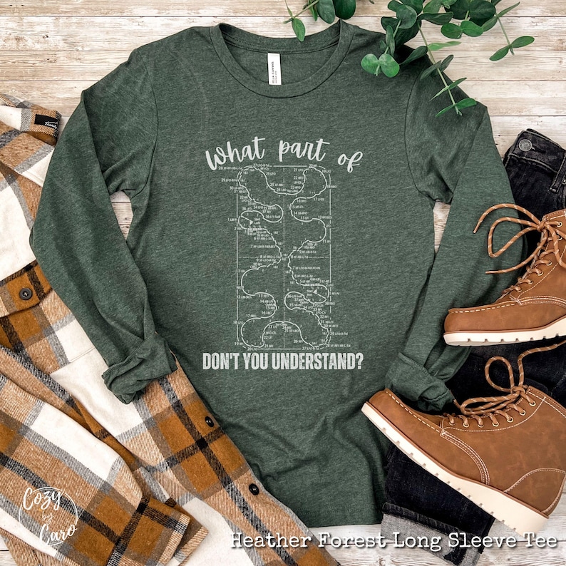 May include: A long-sleeved heather forest green t-shirt with a white graphic of a map and the text "What part of don't you understand?"
