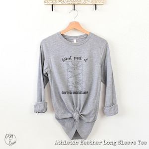 May include: Gray long-sleeve t-shirt with a black graphic of a map and the text "what part of DON'T YOU UNDERSTAND?"
