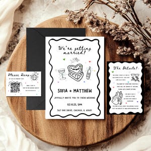 May include: A black and white wedding invitation with a doodle illustration of a cake, champagne flute, and wine bottle. The text reads "We're getting married!" followed by the couple's names "Sofia + Matthew" and wedding details. A separate card with the text "The Details!" lists the wedding ceremony and reception details.