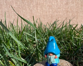 Gnome! A tiny baby blue fellow