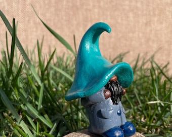 Gnome! A wonderful little fellow with a handsome teal hat