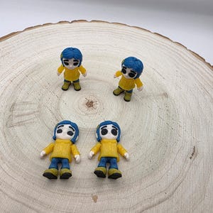 Figura articulada de Coraline impresa en 3D mini