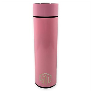May include: A pink insulated water bottle with a black base and a matching pink lid. The bottle has a silver logo near the bottom. The bottle is cylindrical and appears to be made of metal.