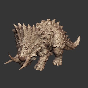 May include: A monochromatic tan figurine of a triceratops dinosaur featuring a large frill with pointed spikes, two prominent brow horns, a smaller nose horn, and a textured, armored hide with plate-like scales covering its body and tail.