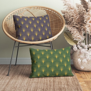 May include: Two rectangular throw pillows featuring a repeating fan-shaped pattern. One pillow is dark blue with yellow fan details, while the other is dark green with yellow fan details. Both pillows have a consistent geometric arc design.