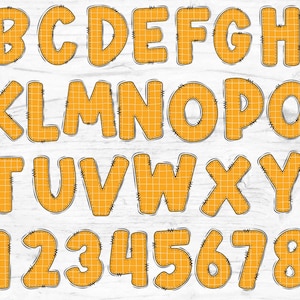 May include: A set of orange felt letters and numbers with a grid pattern and black stitching. The letters are uppercase and the numbers are from 0 to 9.