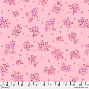May include: Pink fabric with a repeating pattern of purple and red floral clusters and scattered leaves. The flowers have small, delicate petals. The fabric has a light pink background and is measured in inches.