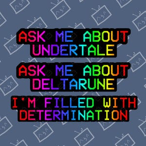 May include: A sticker featuring three lines of pixelated text with a rainbow gradient. The text reads: ASK ME ABOUT UNDERTALE, ASK ME ABOUT DELTARUNE, and I'M FILLED WITH DETERMINATION. The letters are set against a black background with a thin border.