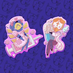 May include: Two stickers featuring stylized characters. The left character is a blue robot in a pink nurse outfit sitting on a large syringe. The right character has a white mask with a cross, wearing a white coat and holding a large blue pill.
