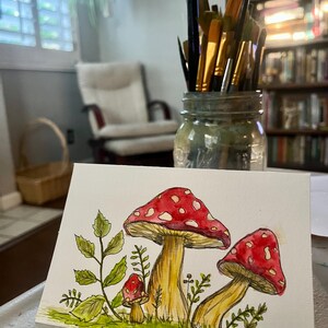 Tarjetas de acuarela pintadas a mano para regalar: naturaleza, playa, flores, formas geométricas, desierto, diseños sencillos.