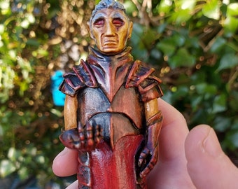 Handcarved and original limewood elven figure in detailed armor