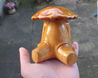 Handcarved limewood and spruce sitting mushroom guy