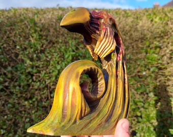 Handcarved and handpainted limewood god of death idol